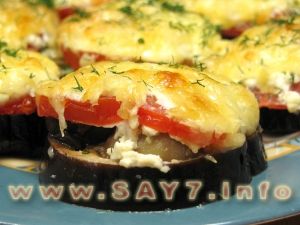 Baked eggplants with tomatoes and mushrooms