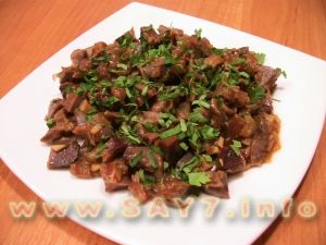 Fried chicken stomachs with onion and soy sauce
