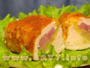 Chicken filet stuffed with cheese, ham and pineapples