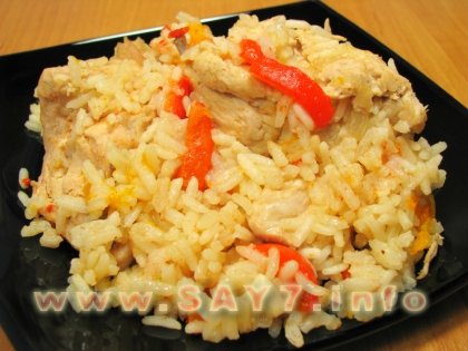 Курица, тушенная с рисом и овощами