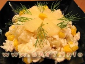 Salad with chicken filet and pineapples