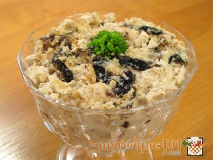 Salad with chicken filet, dried plums and nuts