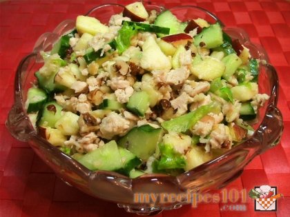 Salad with chicken filet, cucumbers and nuts