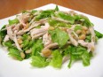 Salad with chicken filet and cedar nuts