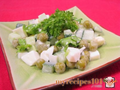 Salad with cucumbers, green peas and eggs