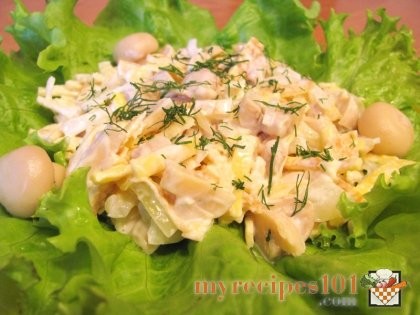Salad with mushrooms, pancakes and onion