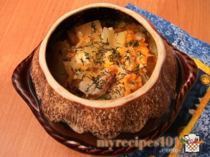 Pots with fish and potatoes