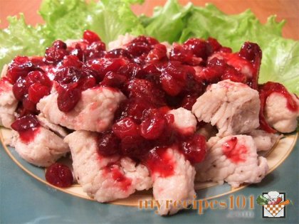 Turkey filet under cranberry sauce