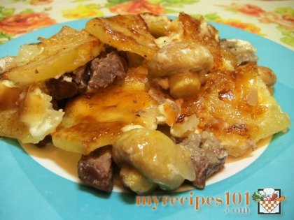 Fried beef with potatoes and mushrooms